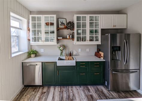 white cabinets with stainless steel appliance|white appliances with stainless accents.